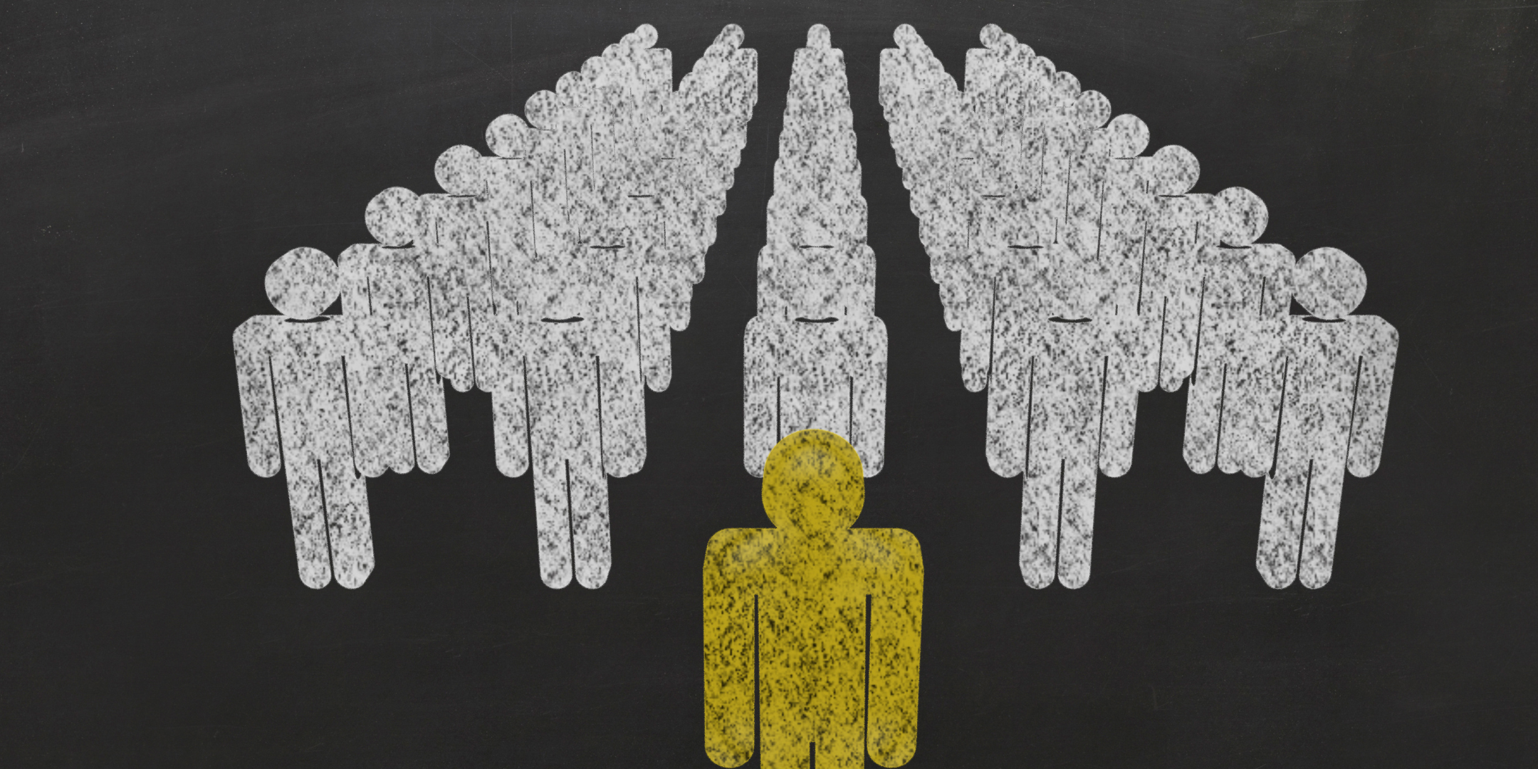 A hand holds a yellow stick figure, with a group of white stick figures fanned out behind it, drawn on a dark background.