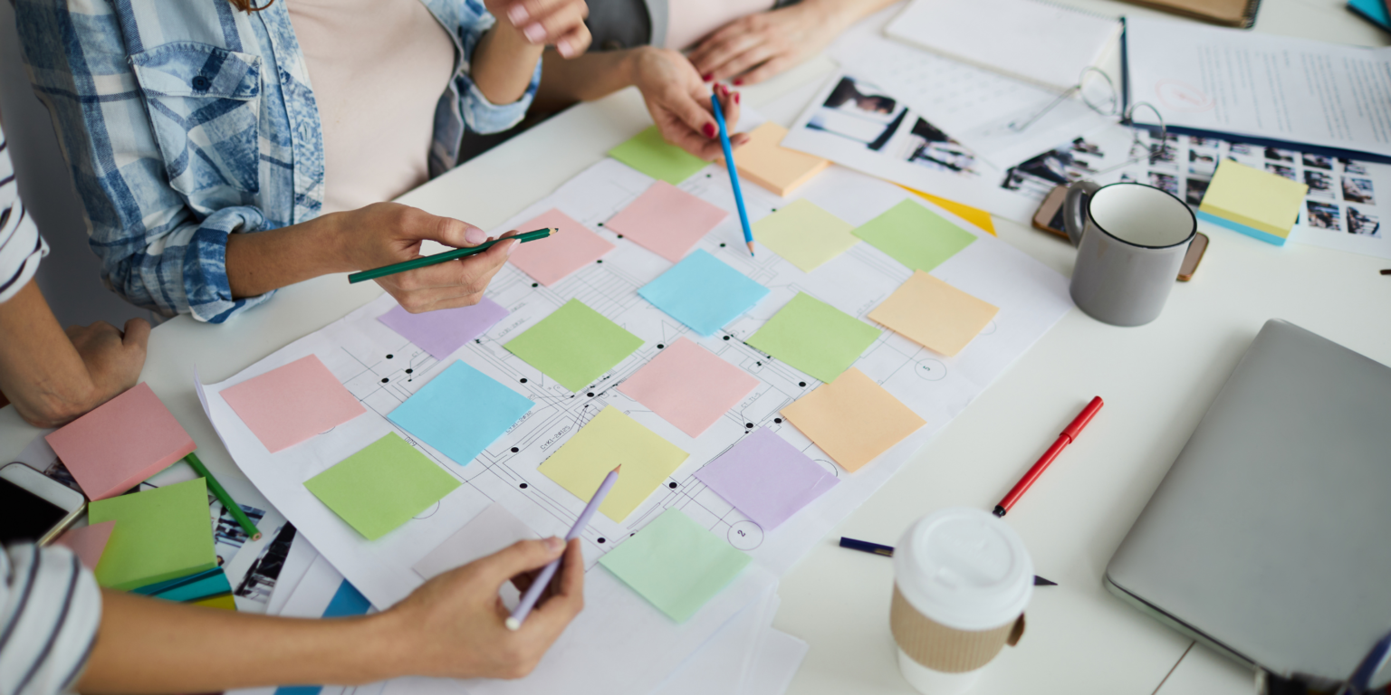 table with colored post it notes